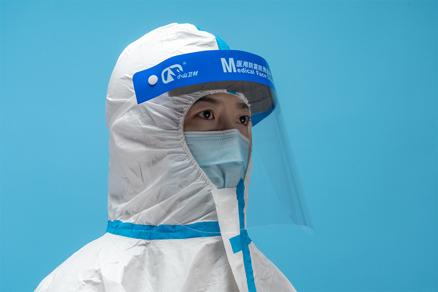 What are the main distinctions between face shields and face masks regarding protection, comfort, and suitability for various medical tasks or patient care?